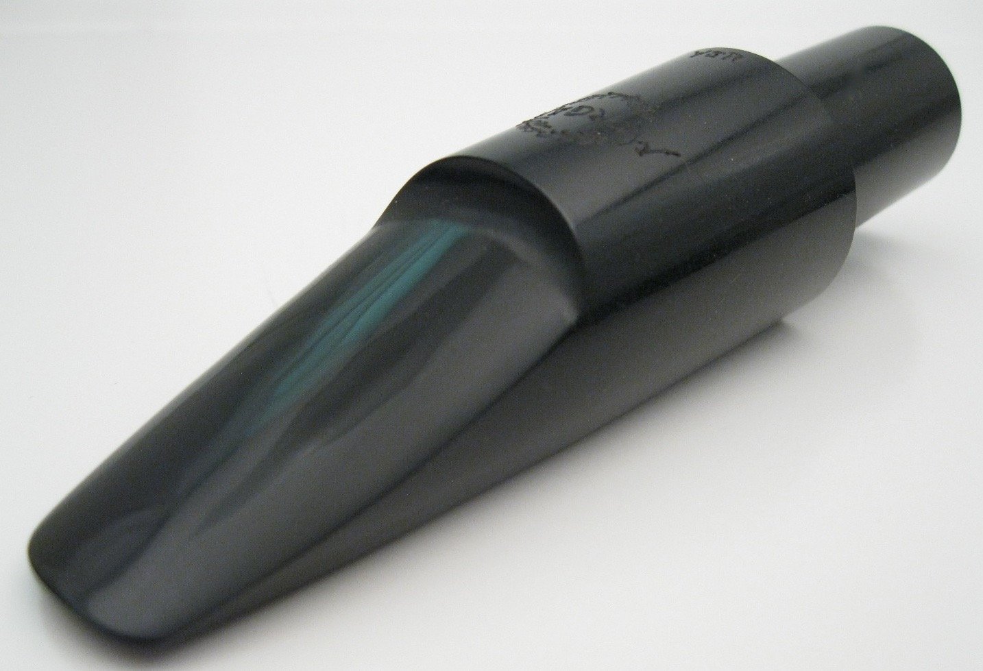 left side angle of morgan florida baritone jazz hard rubber saxophone mouthpiece 